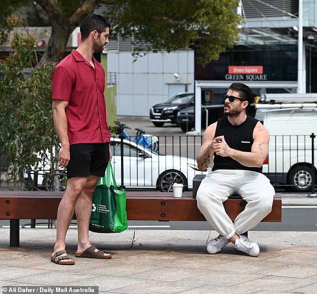 Earlier in the day, newlyweds Paul Antoine and Ryan were spotted among the crowds in Green Square, mingling as they eagerly awaited the Queen's arrival.