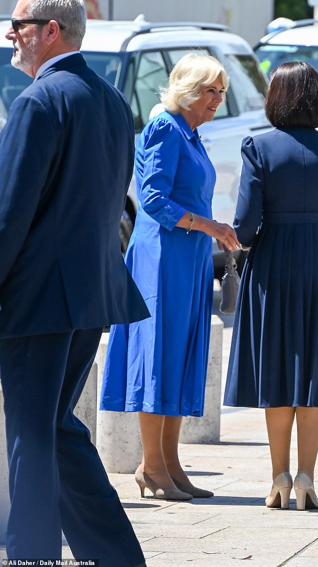 As Camilla, 77, dressed in a regal blue midi dress that flattered her timeless style, waved to the small crowd gathered for her public appearance, it's safe to say the MAFS cast couldn't resist watching the Queen's grand entrance.