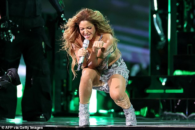 On Friday, the singer announced that she was postponing the North American leg of her world tour until May 2025 in order to move arena shows to larger stadiums due to extreme demand; pictured in July in Miami, Florida